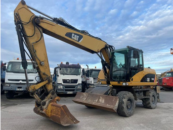 Pelle sur pneus CATERPILLAR M316