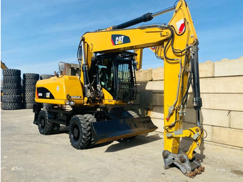 Pelle sur pneus CAT M 318 D: photos 4