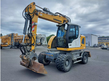 Pelle sur pneus LIEBHERR A 914