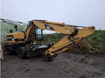 Pelle sur pneus CATERPILLAR M318