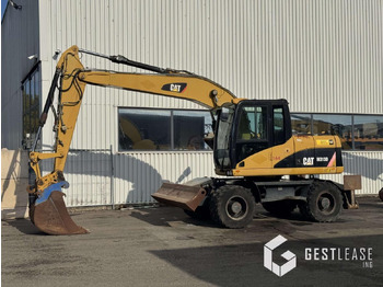 Pelle sur pneus CATERPILLAR M313D