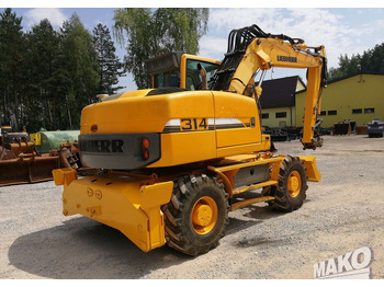 Pelle sur pneus Liebherr A 314 Litronic: photos 5