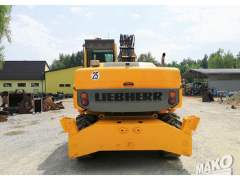 Pelle sur pneus Liebherr A 314 Litronic: photos 4