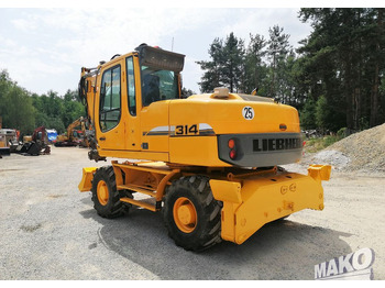 Pelle sur pneus Liebherr A 314 Litronic: photos 3