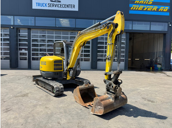 Pelle sur chenille NEUSON 6003: photos 2
