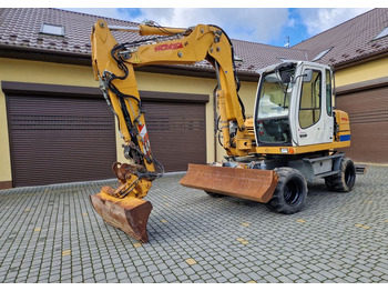 Pelle sur pneus LIEBHERR A 311