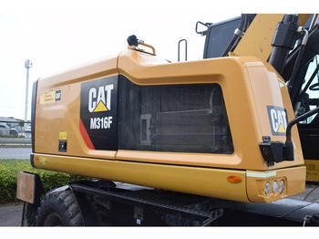 Pelle sur pneus Caterpillar M316F: photos 4