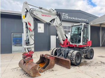 Pelle sur pneus TAKEUCHI