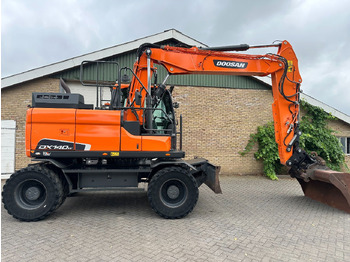 Pelle sur pneus Doosan DX140W-5: photos 5