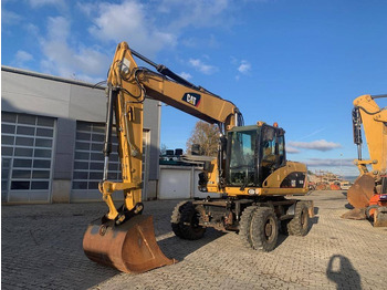 Pelle sur pneus CATERPILLAR M316D