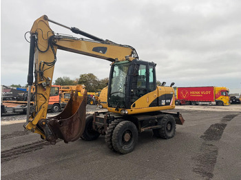Pelle sur pneus CATERPILLAR M313D