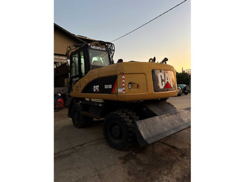 Pelle sur pneus Caterpillar M316D: photos 5