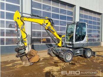 Pelle sur pneus 2018 Wacker Neuson EW65: photos 1