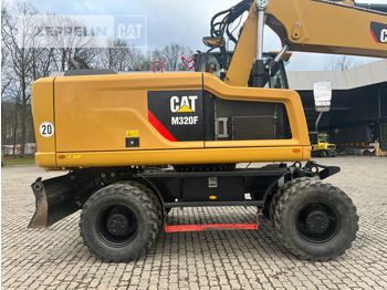 Pelle sur pneus Cat M320F: photos 4