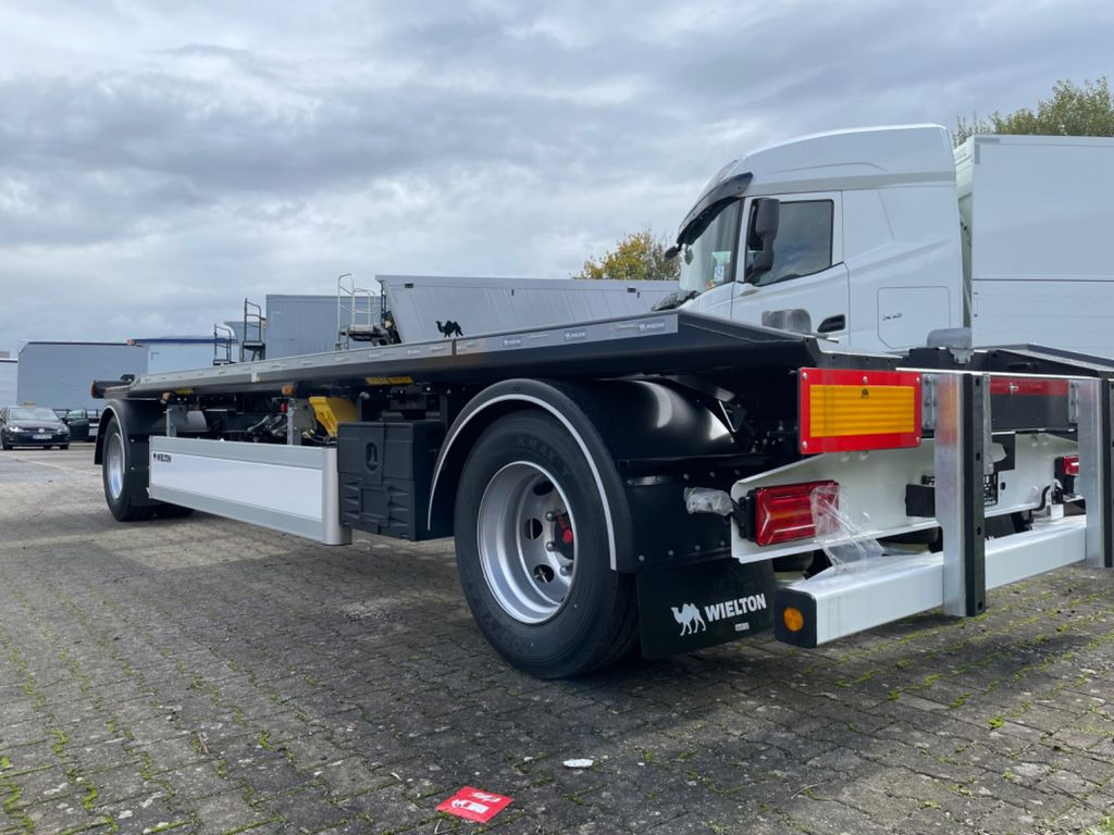 Wielton 2-Achs Außenroller-Abrollanhänger Wielton 2-Achs Außenroller-Abrollanhänger - Remorque ampliroll/ Multibenne: photos 3 Wielton 2-Achs Außenroller-Abrollanhänger Wielton 2-Achs Außenroller-Abrollanhänger - Remorque ampliroll/ Multibenne: photos 3
