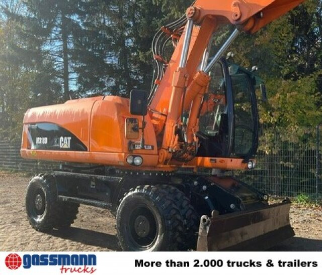 CAT M318D Mobilbagger - Pelle sur pneus: photos 5 CAT M318D Mobilbagger - Pelle sur pneus: photos 5