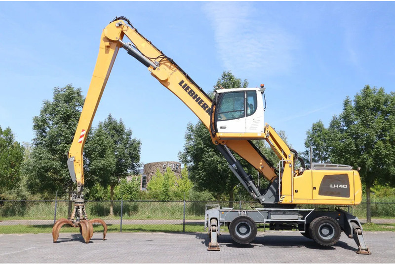 Liebherr LH 40 M LITRONIC | GRAB | QUICK COUPLER | 16 METER - Pelle de manutention: photos 1 Liebherr LH 40 M LITRONIC | GRAB | QUICK COUPLER | 16 METER - Pelle de manutention: photos 1