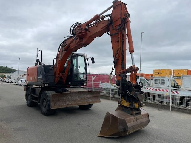 Hitachi ZX140W-5B - Pelle sur pneus: photos 2 Hitachi ZX140W-5B - Pelle sur pneus: photos 2