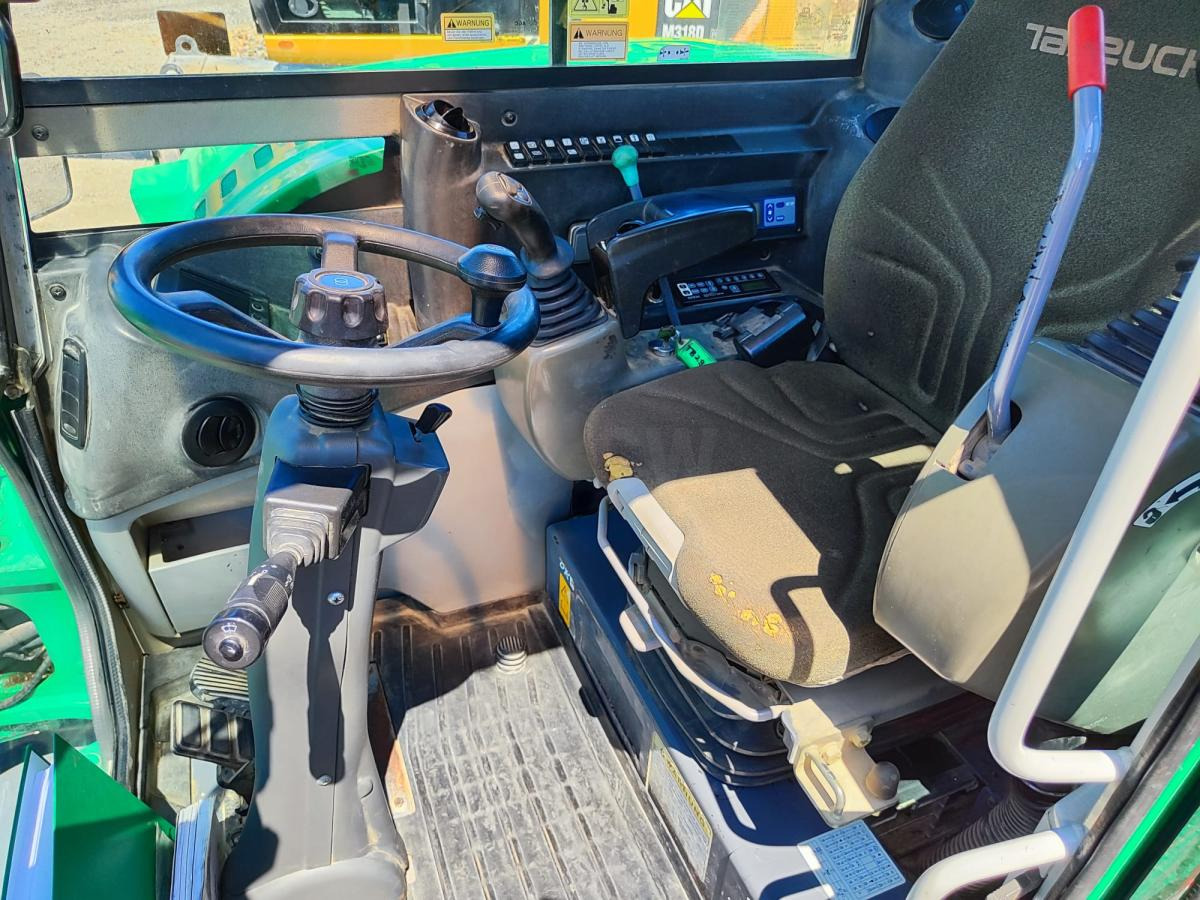 Takeuchi TB295W - Pelle sur pneus: photos 5 Takeuchi TB295W - Pelle sur pneus: photos 5