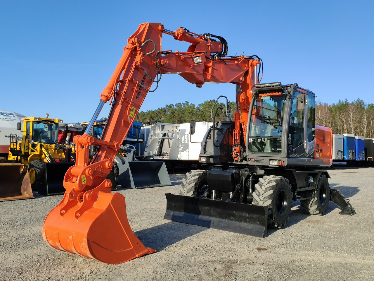 Hitachi ZX140 Koparka Kołowa - Pelle sur pneus: photos 4 Hitachi ZX140 Koparka Kołowa - Pelle sur pneus: photos 4
