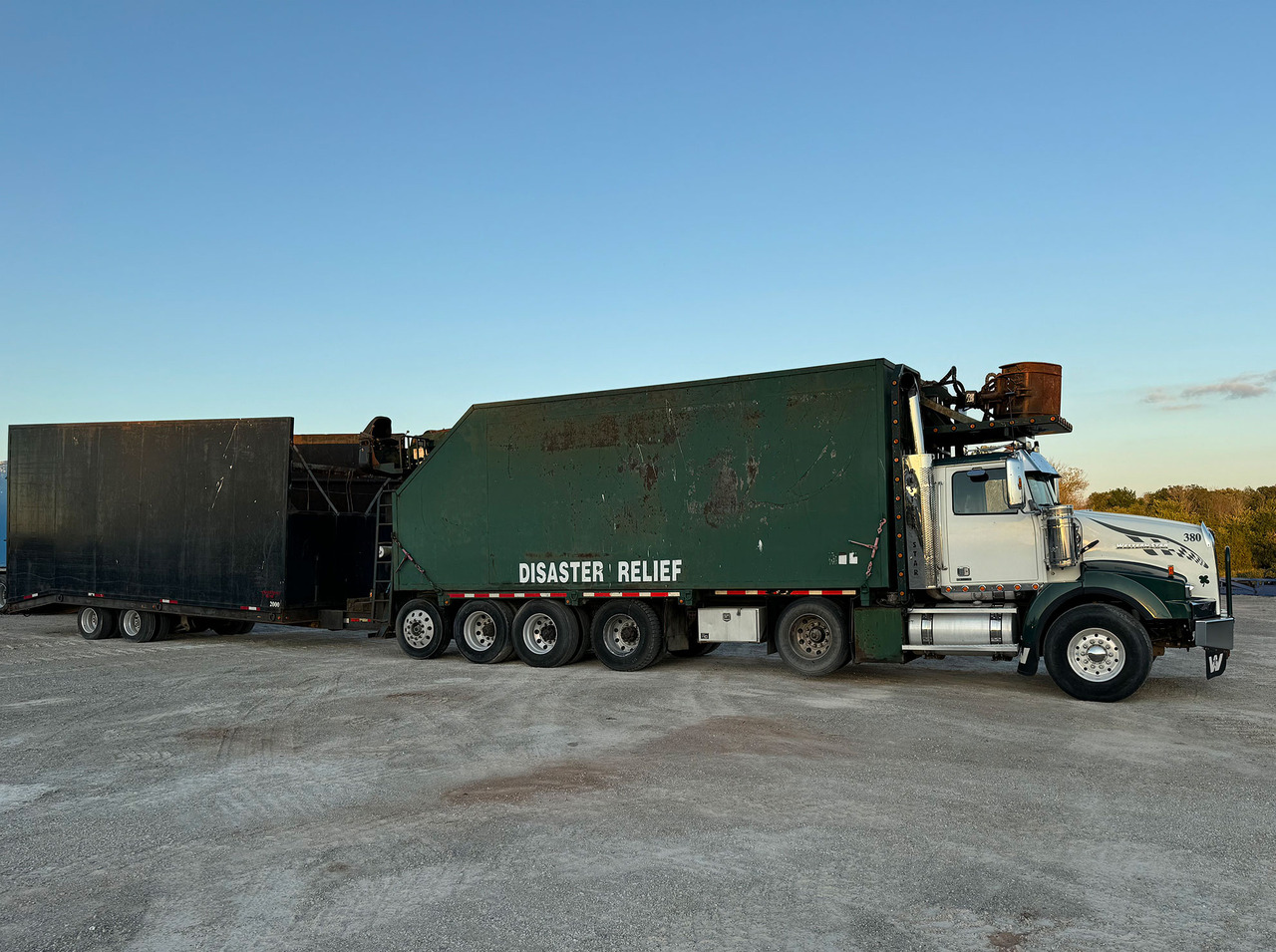 Western Star W4900 SB - Benne à ordures ménagères: photos 1 Western Star W4900 SB - Benne à ordures ménagères: photos 1