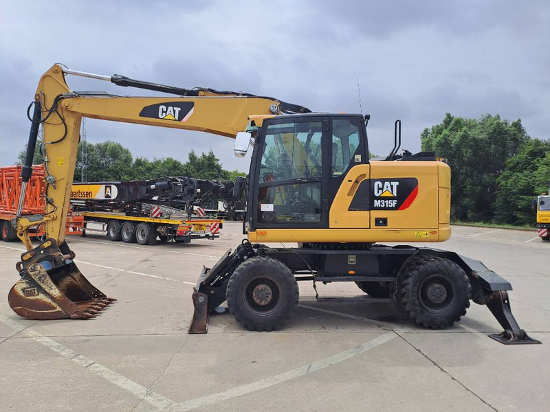 Cat M 315 F - Pelle sur pneus: photos 1 Cat M 315 F - Pelle sur pneus: photos 1