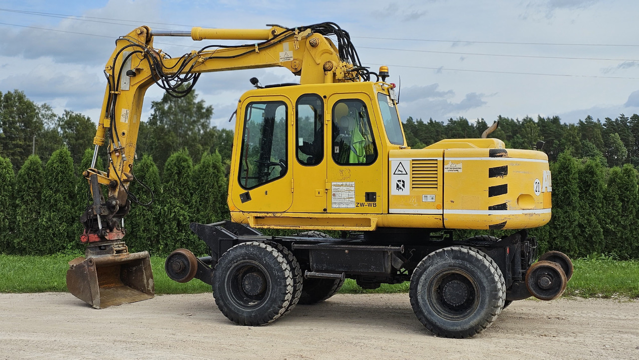 ATLAS 1304KZW railroad - Pelle sur pneus: photos 3 ATLAS 1304KZW railroad - Pelle sur pneus: photos 3