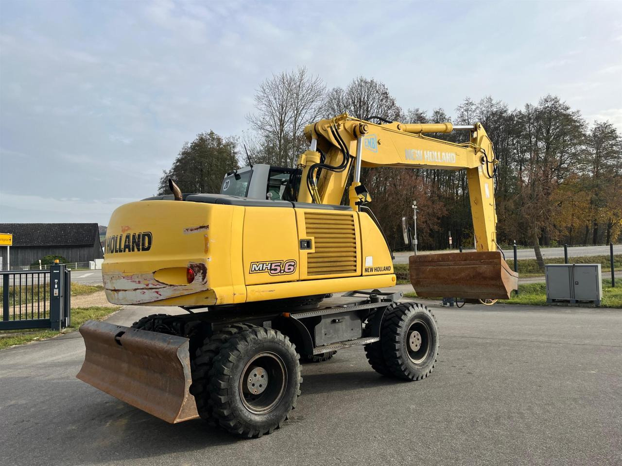 New Holland MH 5.6 inkl. Grabenlöffel, Tieflöffel - Pelle sur pneus: photos 5 New Holland MH 5.6 inkl. Grabenlöffel, Tieflöffel - Pelle sur pneus: photos 5