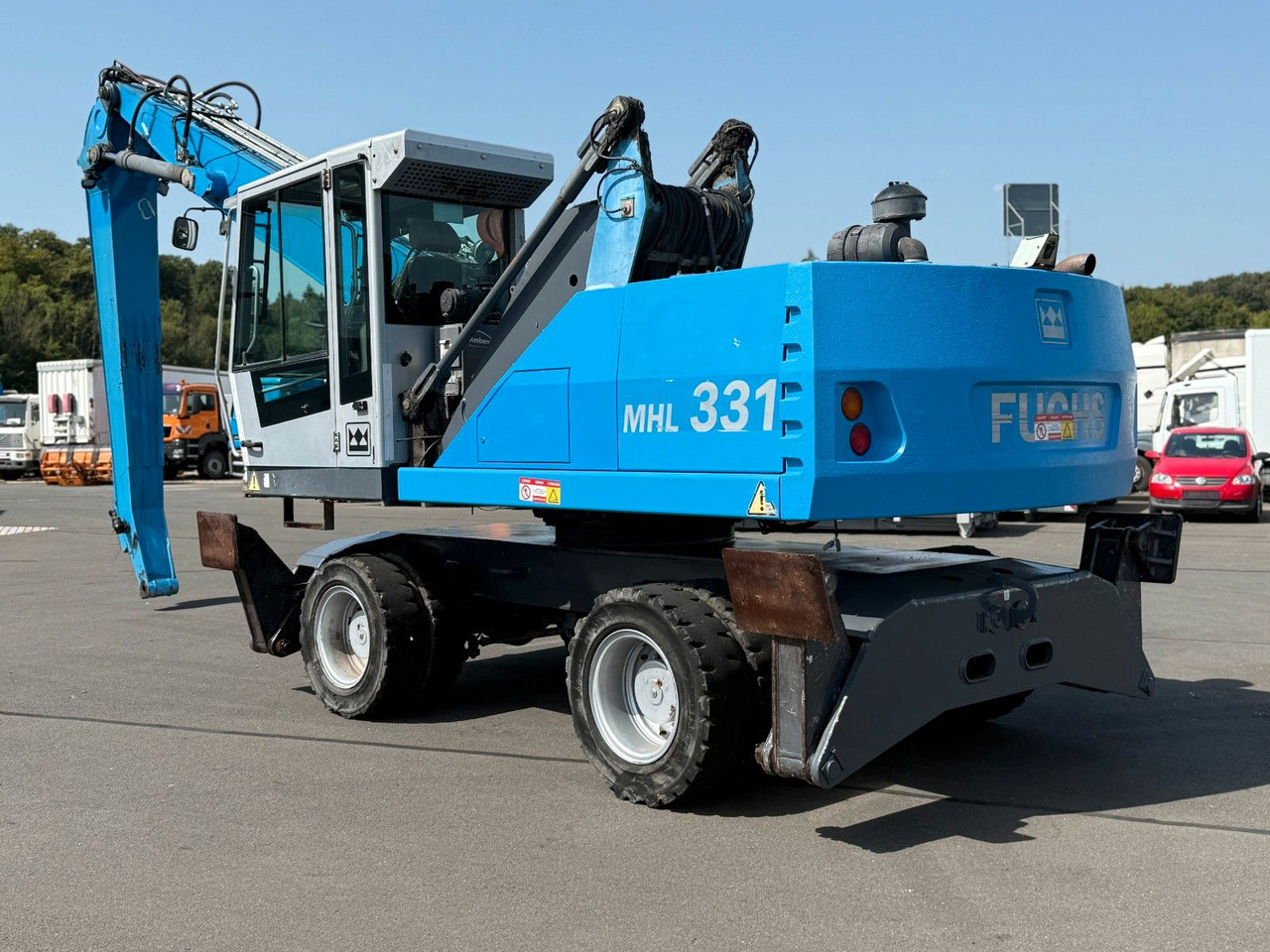 Fuchs MHL 331 - Pelle sur pneus: photos 1 Fuchs MHL 331 - Pelle sur pneus: photos 1
