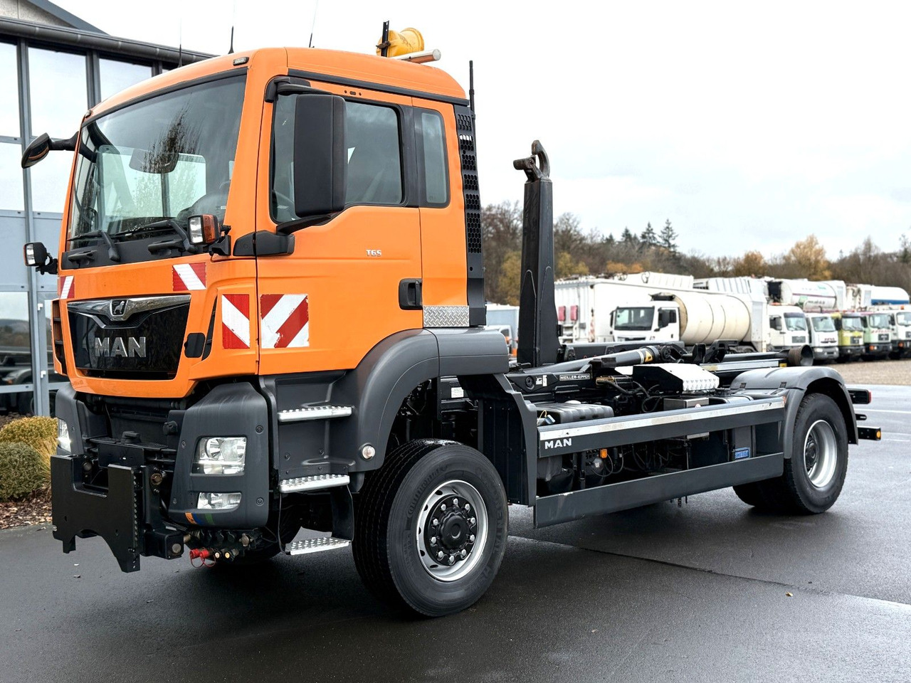 MAN TGS 18.360 4x4 Winterdienst Meiller Abroller - Camion ampliroll: photos 1 MAN TGS 18.360 4x4 Winterdienst Meiller Abroller - Camion ampliroll: photos 1