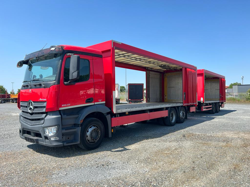 MERCEDES-BENZ Antos 2540 L 6x2 Pritsche LBW Coca Cola LBW 2to - Camion à rideaux coulissants: photos 1 MERCEDES-BENZ Antos 2540 L 6x2 Pritsche LBW Coca Cola LBW 2to - Camion à rideaux coulissants: photos 1