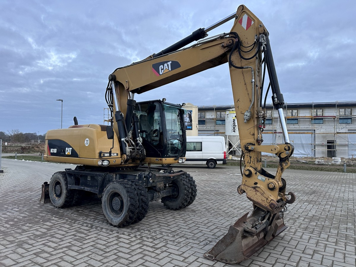 CATERPILLAR M 318 D full Hydr. Top Zustand German machine ! - Pelle sur pneus: photos 5 CATERPILLAR M 318 D full Hydr. Top Zustand German machine ! - Pelle sur pneus: photos 5