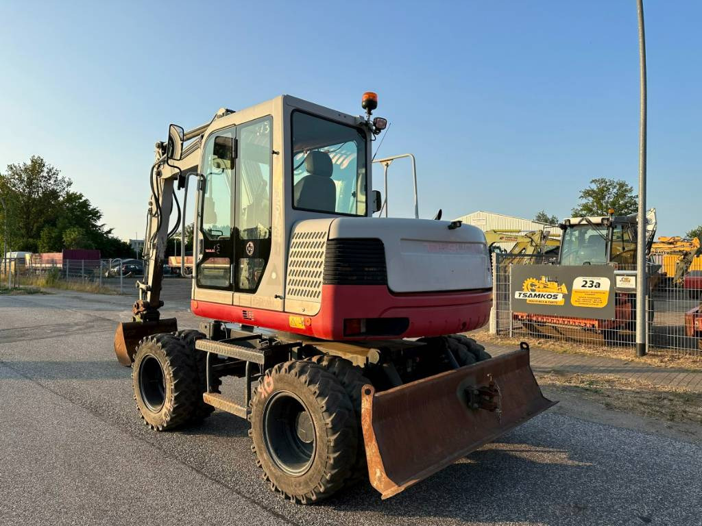 Takeuchi TB 175 W 8,7 ton. Klima Turbo 77 PS - Pelle sur pneus: photos 5 Takeuchi TB 175 W 8,7 ton. Klima Turbo 77 PS - Pelle sur pneus: photos 5