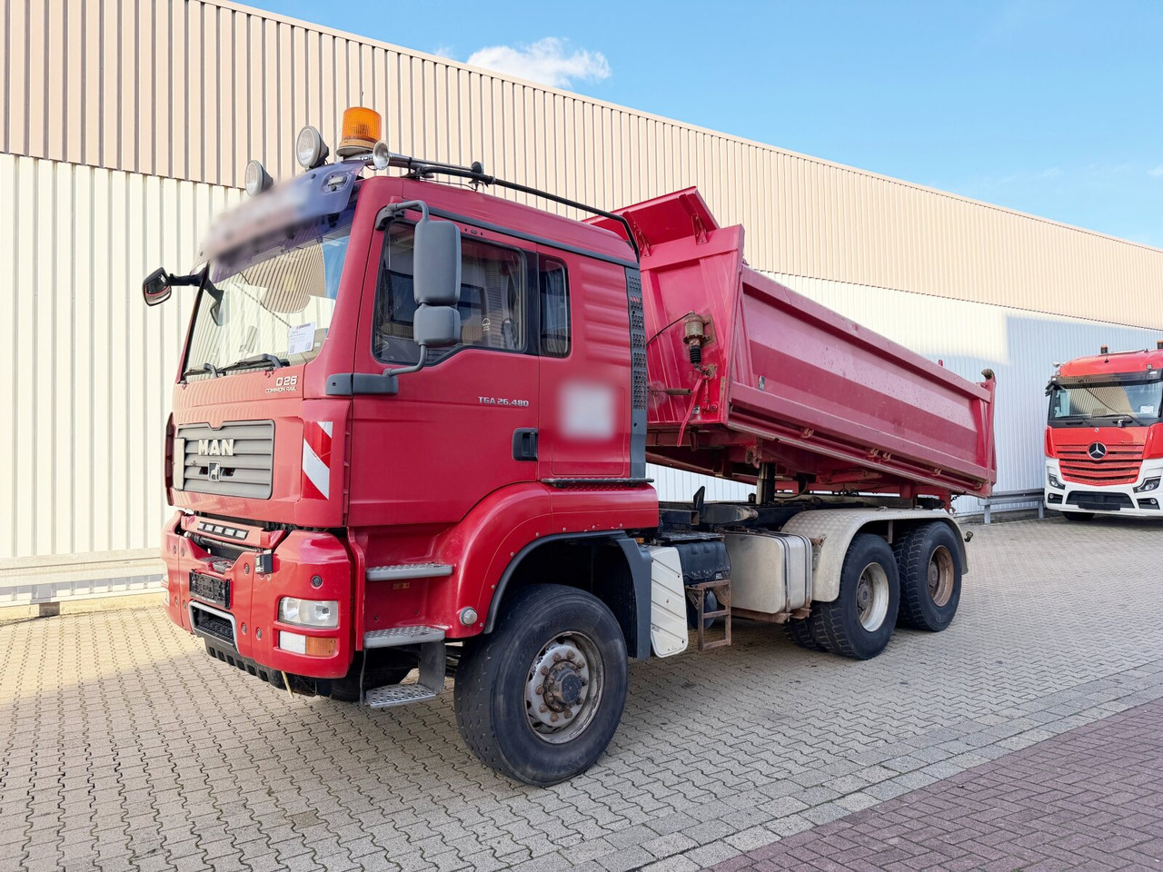 MAN TGA 26.480 6X6H BL TGA 26.480 6X6H BL, HydroDrive, Intarder, Wechselsystem (Sattelplatte) - Camion benne: photos 1 MAN TGA 26.480 6X6H BL TGA 26.480 6X6H BL, HydroDrive, Intarder, Wechselsystem (Sattelplatte) - Camion benne: photos 1