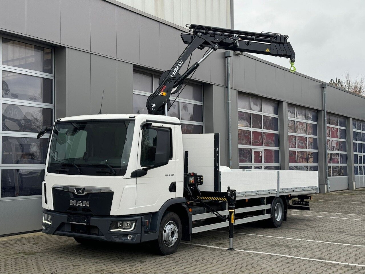 MAN TGL 12.190 4x2 BL TGL 12.190 4x2 BL mit Kran Hiab Hiduo 072DS-4 - Camion grue: photos 1 MAN TGL 12.190 4x2 BL TGL 12.190 4x2 BL mit Kran Hiab Hiduo 072DS-4 - Camion grue: photos 1
