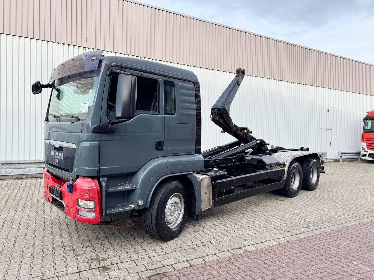 MAN TGS 26.440 6x4 BB TGS 26.440 6x4 BB, Meiller Schub-Knick - Camion ampliroll: photos 1 MAN TGS 26.440 6x4 BB TGS 26.440 6x4 BB, Meiller Schub-Knick - Camion ampliroll: photos 1