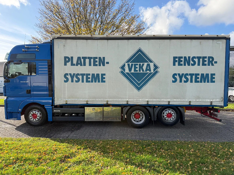 MAN TGX 26.500 STANDKLIMA + 6X2 + EURO 6 - Camion à rideaux coulissants: photos 2 MAN TGX 26.500 STANDKLIMA + 6X2 + EURO 6 - Camion à rideaux coulissants: photos 2