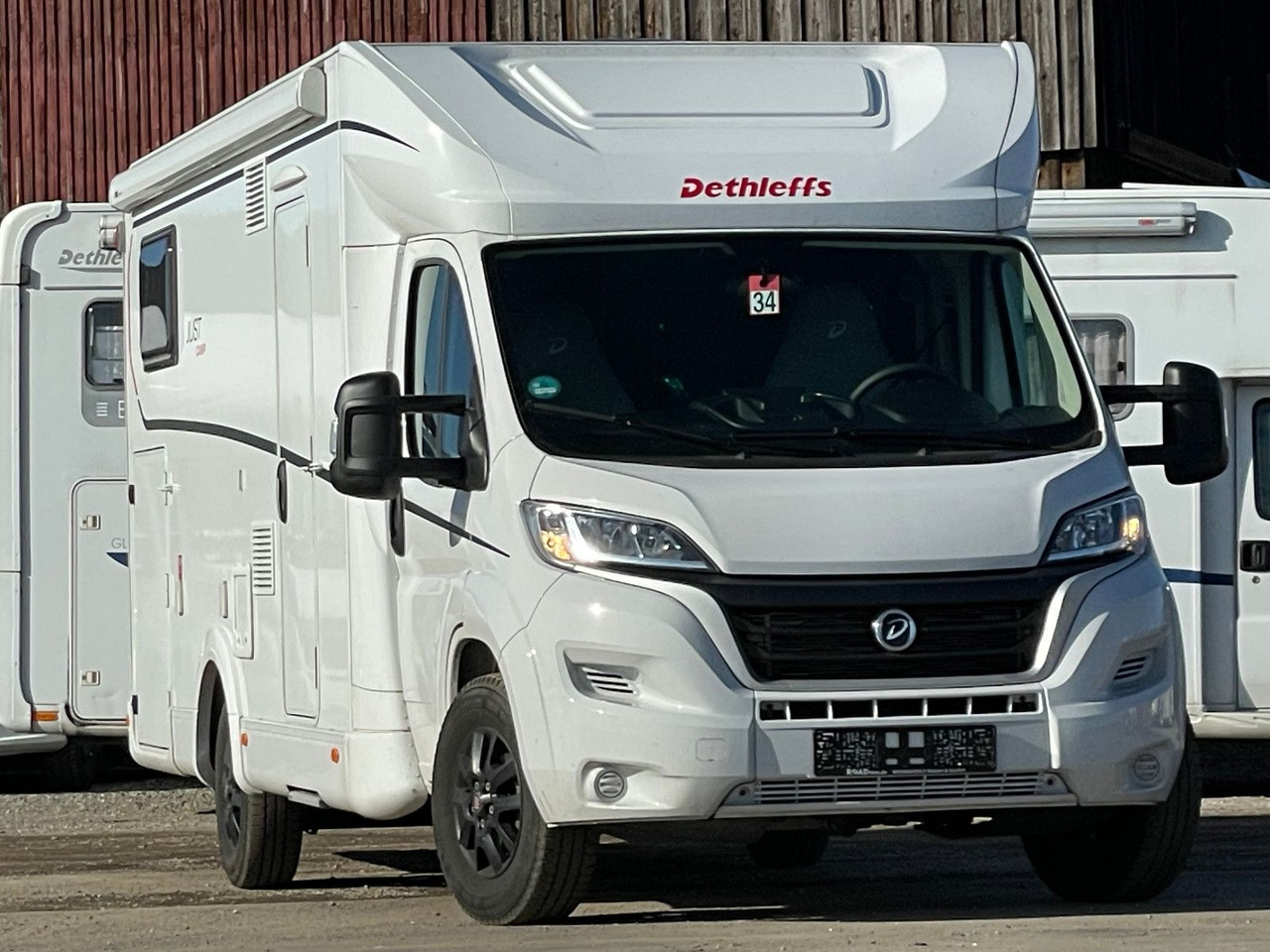 Dethleffs Just T 7052 EB mit Hubbett,Fiat,Markise,RFK,Navi - Camping-car profilé: photos 1 Dethleffs Just T 7052 EB mit Hubbett,Fiat,Markise,RFK,Navi - Camping-car profilé: photos 1