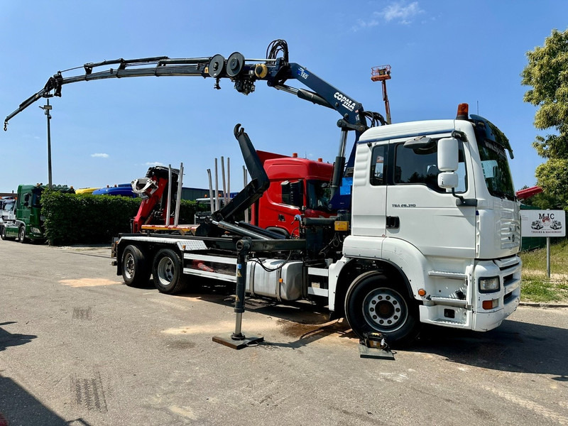 MAN TGA 26.310 6X2 HOOKLIFT + CRANE COPMA 160.4 + JIB J2 + WINCH - RADIO - LIFT + STEERING AXLE - EURO 3 - BE - Camion grue: photos 1 MAN TGA 26.310 6X2 HOOKLIFT + CRANE COPMA 160.4 + JIB J2 + WINCH - RADIO - LIFT + STEERING AXLE - EURO 3 - BE - Camion grue: photos 1