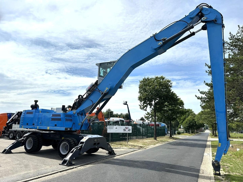 Terex FUCHS MHL 360 OVERSLAGKRAAN / MATERIAL HANDLER / UMSCHLAGBAGGER - TOP ZUSTAND - Pelle sur pneus: photos 1 Terex FUCHS MHL 360 OVERSLAGKRAAN / MATERIAL HANDLER / UMSCHLAGBAGGER - TOP ZUSTAND - Pelle sur pneus: photos 1