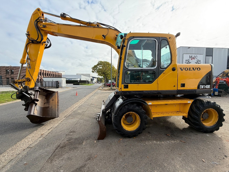 Volvo EW 140 B *FULL HYDR* - BLADE - 10.485h - TILT BUCKET - CE - NL MACHINE - GOOD CONDITION - Pelle sur pneus: photos 5 Volvo EW 140 B *FULL HYDR* - BLADE - 10.485h - TILT BUCKET - CE - NL MACHINE - GOOD CONDITION - Pelle sur pneus: photos 5