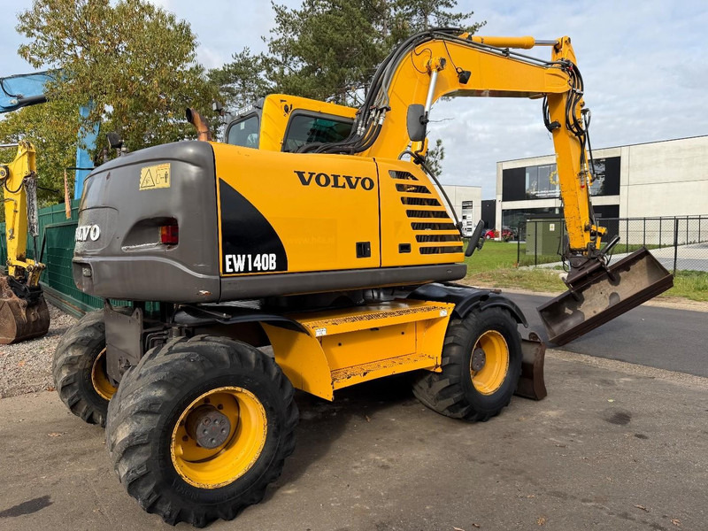 Volvo EW 140 B *FULL HYDR* - BLADE - 10.485h - TILT BUCKET - CE - NL MACHINE - GOOD CONDITION - Pelle sur pneus: photos 3 Volvo EW 140 B *FULL HYDR* - BLADE - 10.485h - TILT BUCKET - CE - NL MACHINE - GOOD CONDITION - Pelle sur pneus: photos 3