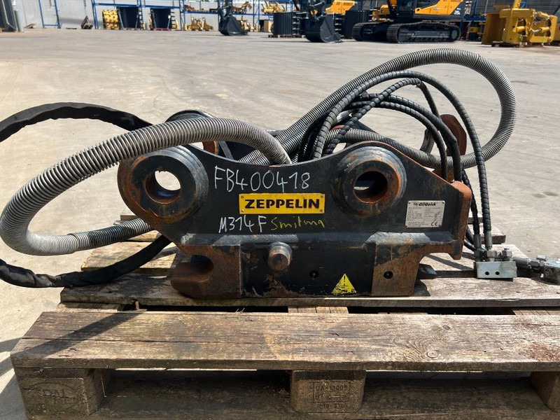 OilQuick OQ65 - M314F / M316F / M318F - Attache rapide pour Engins de chantier: photos 4 OilQuick OQ65 - M314F / M316F / M318F - Attache rapide pour Engins de chantier: photos 4