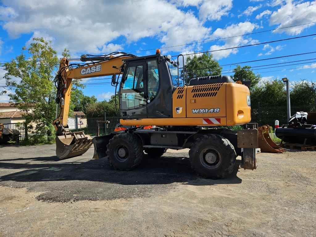 CASE WX 145 - Pelle sur pneus: photos 4 CASE WX 145 - Pelle sur pneus: photos 4