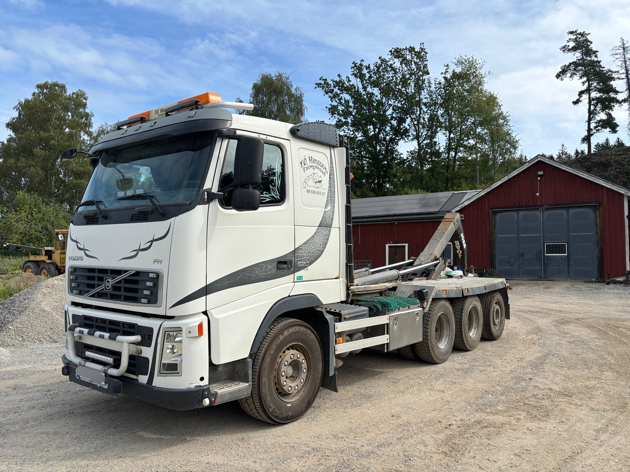Volvo FH 520 37 8X4 - Camion ampliroll: photos 1 Volvo FH 520 37 8X4 - Camion ampliroll: photos 1