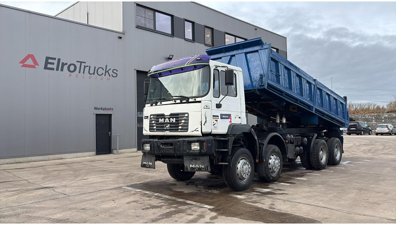 MAN 35.414 (6 CYLINDER / 8X6 / BIG AXLES / STEEL SUSP. / LAMES / GRAND PONT) - Camion benne: photos 1 MAN 35.414 (6 CYLINDER / 8X6 / BIG AXLES / STEEL SUSP. / LAMES / GRAND PONT) - Camion benne: photos 1