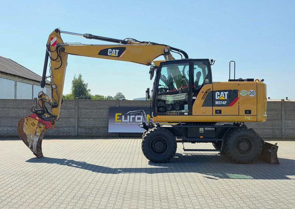 Caterpillar M314F, 2019 ROK, 3300 MTH, OIL QUICK OQ 65 - Pelle sur pneus: photos 2 Caterpillar M314F, 2019 ROK, 3300 MTH, OIL QUICK OQ 65 - Pelle sur pneus: photos 2