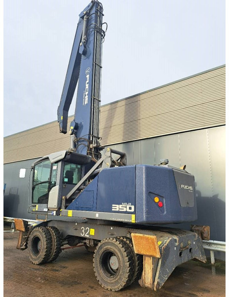 Fuchs MHL 350 F - Pelle de manutention: photos 1 Fuchs MHL 350 F - Pelle de manutention: photos 1