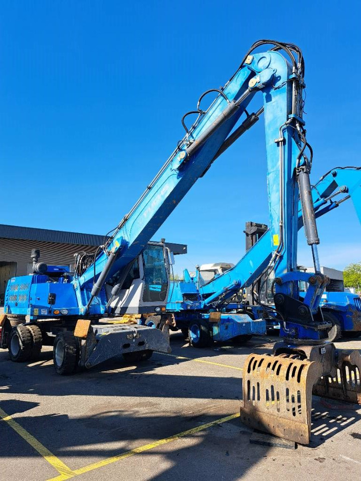 Fuchs MHL331E + Grapple - Pelle de manutention: photos 2 Fuchs MHL331E + Grapple - Pelle de manutention: photos 2
