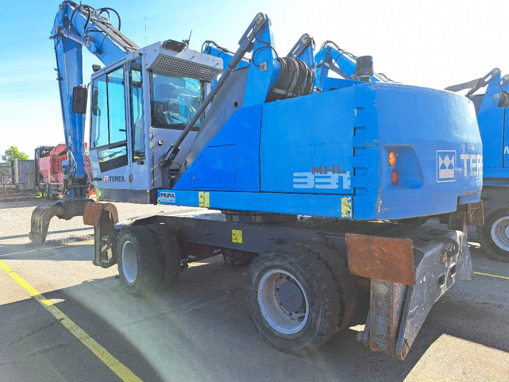 Fuchs MHL331E + Grapple - Pelle de manutention: photos 3 Fuchs MHL331E + Grapple - Pelle de manutention: photos 3